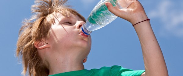 Graphic of boy drinking water on a hot day