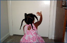 Graphic showing a child touching a closed door