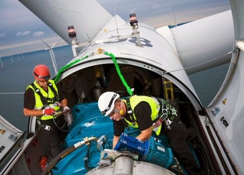 maintenance being done on a wind turbine