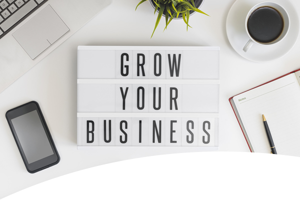 'Sign saying 'Grow Your Business'