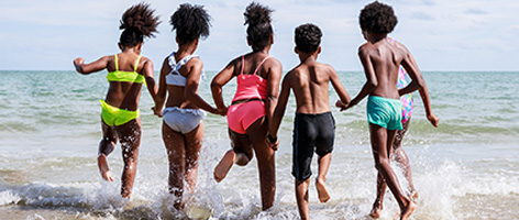 people of color at a beach