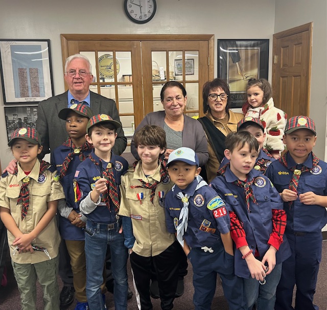 Cub Scout Pack 216 from Ronkonkoma is pictured here with County Comptroller John Kennedy, Legislator